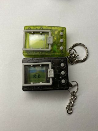 2 - 1997 Bandai Digimon V Pet Version 1 Eng With Key Chain Smoke/yellow