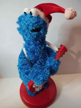 Gemmy Sesame Street Cookie Monster Blue Christmas Santa Sings Animated Guitar