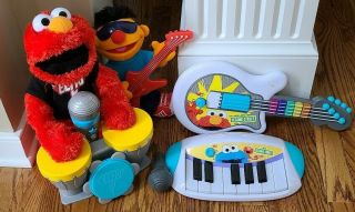 Let’s Rock Elmo Talking Singing 8pc Set With Guitar,  Keyboard,  Microphone,  Ernie