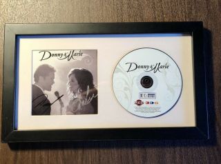 Autographed Donny And Marie Osmond Framed Cd And 2014 Flamingo Vip Pass