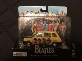 Beatles Corgi Sgt.  Pepper Diecast Car