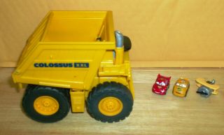 Pixar Cars Colossus Xxl Dump Truck With 3 Drifters Vehicles (2 Cars And 1 Plane)