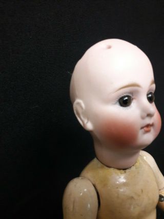 Antique German Bisque Doll with Closed Mouth and Paper Weight Eyes 3