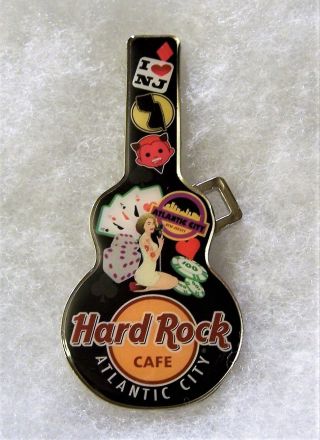 Hard Rock Cafe Atlantic City Guitar Case With Cards Chips & Dice Magnet