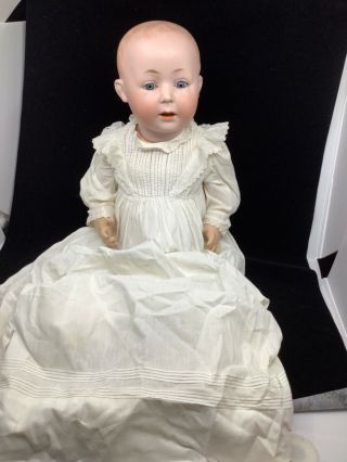 23” Antique Baby Doll.  Blue Sleepy Eyes.  Porcelain Head.  232 Swaine & Co.  ?