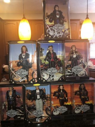 Harley Davidson Barbies.  Set Of 8 Collectors Edition With Motorcycle