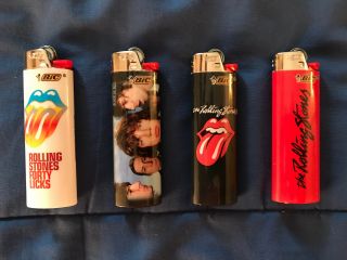 Rolling Stones Bic Lighters.  Group Of Four.  And.