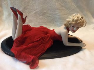 Franklin Marilyn Monroe Porcelain Doll.  Red Dress On Velvet Wooden Platform