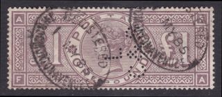Gb.  Qv.  1884.  Sg 185,  £1 Brown Lilac.  Perfin.  Wmk Crowns.