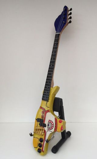 The Beatles Yellow Submarine Guitar Miniature With Stand (uk)