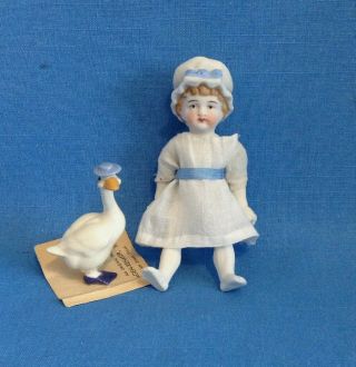4 1/2 " All Bisque Antique Doll - Little Goose Girl