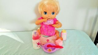 Baby Alive 2006/ Soft Face,  Talks,  Eats,  Poops.  Condition/ Blue Eyes/