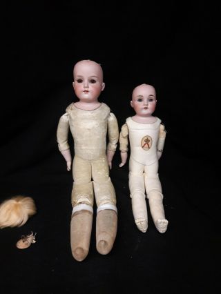 Two Antique Bisque Dolls With Leather Bodies,  One Kestner,  One Armand Marseille