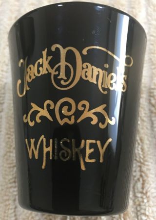 A 2 Black,  Gold Embost Jack Daniels Shot Glasse With No Chips Or Cracks