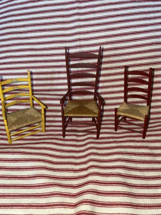 Set Of Three Rush Seat Shaker Style Ladder Back Dollhouse Chairs