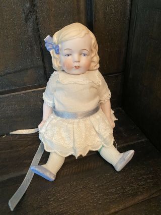 Antique Large 6” All Bisque Hertwig Doll With Molded Hair And Bow Nicely Dressed