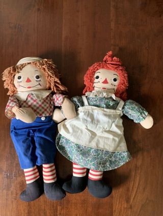 Antique Raggedy Ann And Andy Dolls,  Three Books