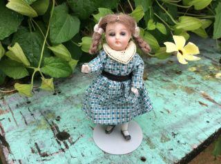 Antique German All Bisque Doll.  Glass Eyes