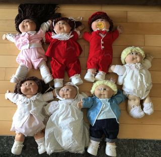 7 Vintage Cabbage Patch Dolls With Clothing.  Boy,  Girl And Baby Doll.