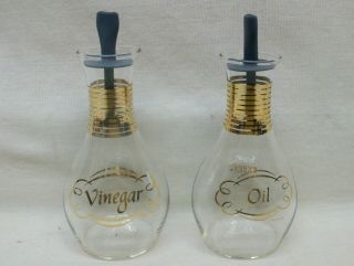 Vintage " Pyrex " Glass Cruets " Oil " & " Vinegar " Clear W/gold Design Plus Stoppers
