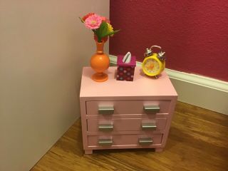 American Girl Doll Pink Dresser With A Vase Of Flowers And A Clock