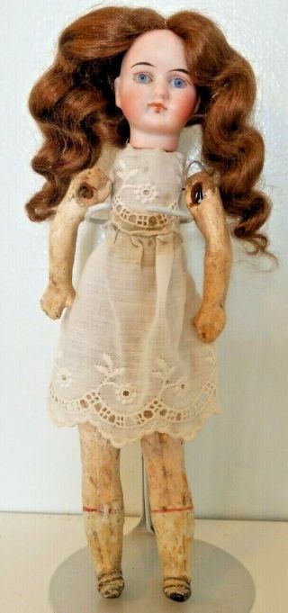 Antique Bisque Head Wood Body Doll 8 1/2 Inches