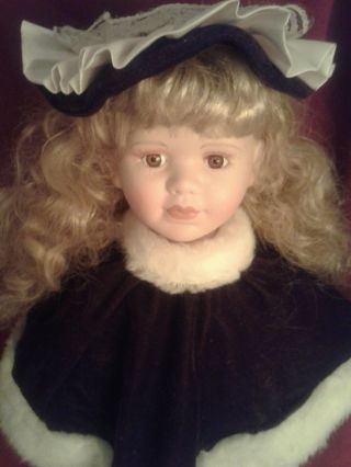 Porcelain Doll.  32 Inch.  Winter Outfit