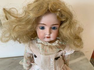 20” Antique German doll marked,  “D 1/2 Made in Germany,  8 1/2,  167.  ” 2