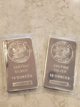 2 - 10 Oz Sunshine Minting Eagle Silver Bars.  999 Fine In Plastic