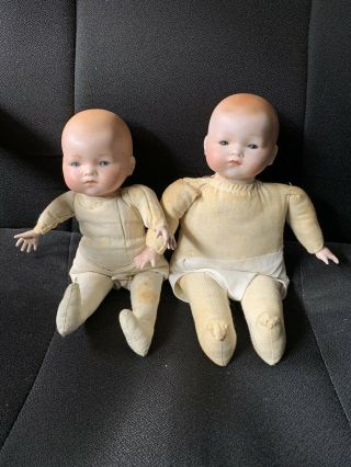 A Antique A.  M.  Germany Baby Dolls Bisque Head Cloth Body 10 " & 11 "