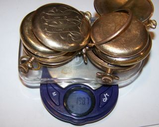 198.  7 Grams Scrap Gold Filled Pocket Watch Cases