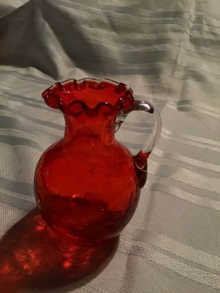 Small Vintage Orange Crackle Glass Pitcher With Applied Handle 4 Inches Tall