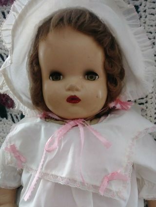 Large Composition Doll 23 Inches Tall.  She Has A Swivel Head.