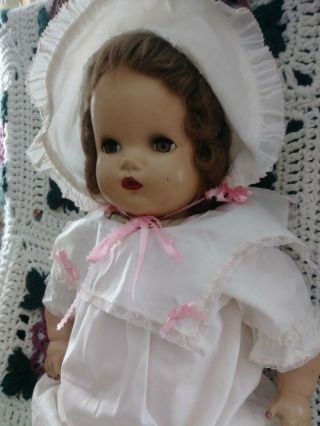 Large Composition Doll 23 inches tall.  She has a swivel head. 2