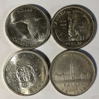 (4) Commemorative Canadian Silver Dollars 2.  4 Ozt Silver 1939,  1958,  1964,  1967