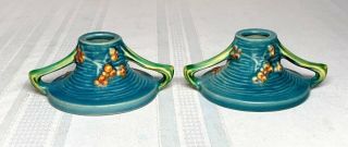 Roseville Pottery,  Bushberry,  Blue Double Twig Handled Candlesticks,