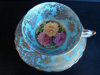 Striking Chrysanthemum Center With Gold And Blue Paragon Tea Cup & Saucer