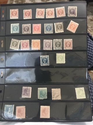 27 Puerto Rico Stamps On An Album Page.  Stamps Up To The $2 Value.  Look