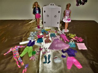 Wardrobe Closet For Dolls Clothes With Dolls And Accessories.
