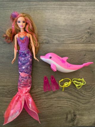 Barbie Dreamtopia Mermaid Rainbow Cove Doll & Pink Dolphin Magic Figure,