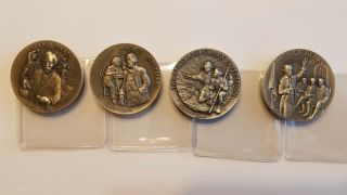 4 - Longines Symphonette Sterling Silver Great American Coins Twain Henry Lewis