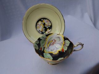 Paragon Black With Handpainted Flowers On Yellow Tea Cup And Saucer