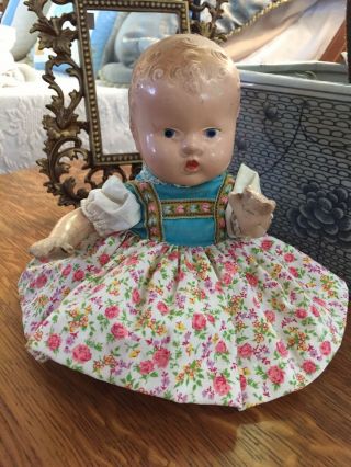 Small 9” 1930’s Composition Doll With Madame Alexander Doll Dress.