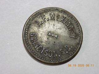 South Dakota - R.  F.  Mckinney / Garretson,  S.  D.  // Good For / 5¢ / In Trade