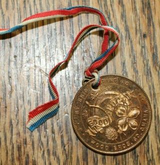 EARLY 1900 WOOD BROS SO OMAHA NB SHEEP COMMISSION GOOD LUCK MEDAL 1 1/4 INCH 2