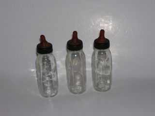 Vintage Evenflo Glass Baby Doll Bottles - Display Wow
