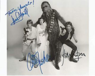 Carrie Fisher,  Mark Hamill,  Harrison Ford Signed Star Wars 8x10