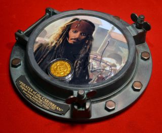 Johnny Depp Signed Pirates Of Caribbean,  Disney Prop Coin,  Porthole Dvd Uacc