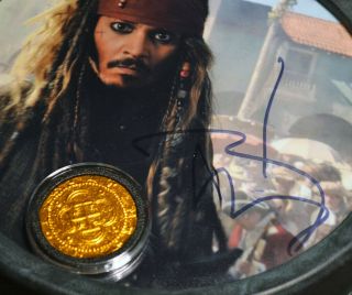 JOHNNY DEPP Signed PIRATES OF CARIBBEAN,  DISNEY PROP Coin,  Porthole DVD UACC 3