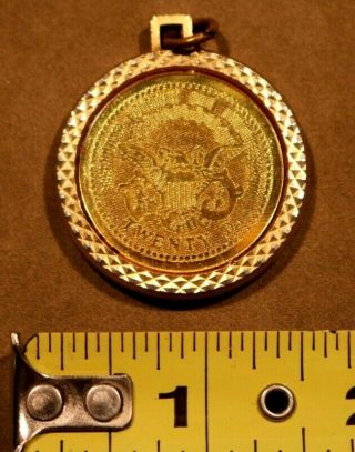 Twenty Dollar gold Coin TRIBUTE in a round Bezel/charm setting 2